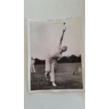 CRICKET, press photos, Harold Larwood, half-length in later years reviewing display of photos from