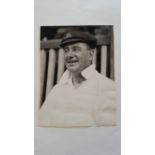 CRICKET, press photo of MA Noble, h/s in cricket whites & cap, agency stamp to back (Sun Herald) &