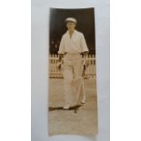 CRICKET, press photo of W Brown, full-length going out to bat, date stamp for date of publishing,