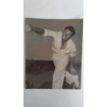 CRICKET, press photo, Richie Benaud, showing him in bowling pose, 8 x 10, some staining to photo,
