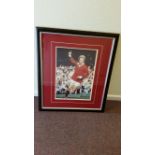 FOOTBALL, signed large colour photo (11.5 x 16.5) by Denis Law, full-length in action,