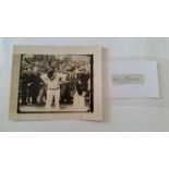 CRICKET, signed piece by Cyril Walters, with photo showing him full-length in front of the crowd for