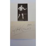 BOXING, signed piece by Kid Lewis, laid down to card beneath photo showing him full-length in boxing