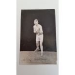 BOXING, signed photo by Johnny Cuthbert, corner-mounted to card showing him full-length in boxing