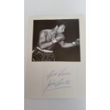 BOXING, signed piece by John Conteh, laid down to card beneath magazine photo showing him half-