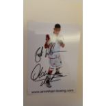 BOXING, signed promotional card by Amir Khan, corner-mounted to card showing him full-length in