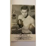 BOXING, signed promotional photo by Terry Downes, corner-mounted to card showing him half-length