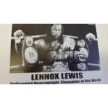 BOXING, signed promotional card by Lennox Lewis, half-length in ring with belts, 6 x 8.5 overall,