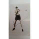 BOXING, signed p/c by Ernie Roderick, corner-mounted to card showing him full-length in boxing pose,