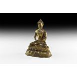 Tibetan Gilt Sitting Buddha Statuette