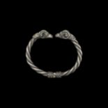 Large Western Asiatic Silver Hinged Bracelet with Rams Heads