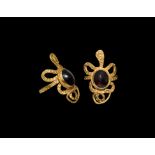 Romano-Egyptian Gold Snake Ring with Garnet