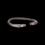 Western Asiatic Silver Bracelet with Animal Head Terminals