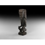 African Crouching Figure