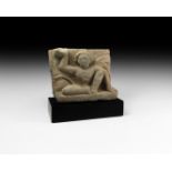 Gandharan Figural Frieze Section with Crouching Atlas