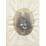 PHOTOGRAPHS. A collection of approximately 50 mounted photographs on twelve album leaves,