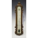 A late Victorian walnut cased wall alcohol thermometer, the bone dial inscribed 'W. Dixey, 241