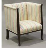 An Edwardian mahogany armchair, upholstered in a striped fabric, on cabriole legs, height 79cm,