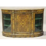 A late Victorian burr walnut and gilt metal mounted credenza with foliate boxwood inlay, the central