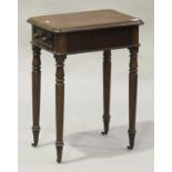 A late Victorian mahogany side table, fitted with opposing frieze drawers, on turned tapering legs