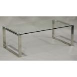 A modern glass and chromium plated coffee table, height 38cm, width 110cm, depth 60cm.Buyer’s