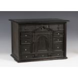 A late 17th/early 18th century Continental ebonized table cabinet of architectural design, the