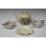 A creamware teapot and cover, circa 1770-80, printed in black to one side with a version of the