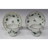 A pair of Bristol porcelain ogee shape tea bowls and two matched saucers, circa 1775, each piece
