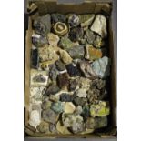 A selection of various mineral specimens, including satin star, campylite, smithsonite and others,