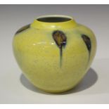 A studio pottery vase, 20th century, of ovoid form, covered in a yellow crystalline glaze with brown