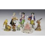 A group of Continental figures, late 19th century and later, including a Sitzendorf figure of a