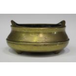 A Chinese polished bronze tripod censer, mark of Xuande but probably 17th/18th century, of bombé