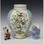 A large Dresden porcelain vase, late 19th century, painted with opposing bird panels within gilt