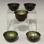 A group of five Chinese metal lined zitan wood cups, late Qing dynasty, each of circular form,