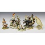 Four Capodimonte porcelain figures, 20th century, including a shepherd boy, height 20cm, and a