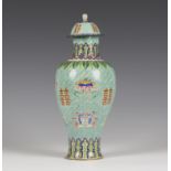 A Chinese Canton enamel vase and cover, Daoguang period, the baluster body decorated with polychrome