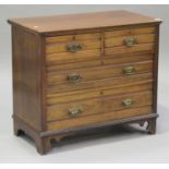 A late Victorian walnut chest of two short and two long drawers, on bracket feet, height 80cm, width