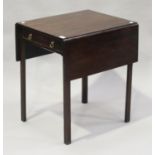 A George III mahogany Pembroke table, fitted with a single drawer, raised on chamfer block legs,