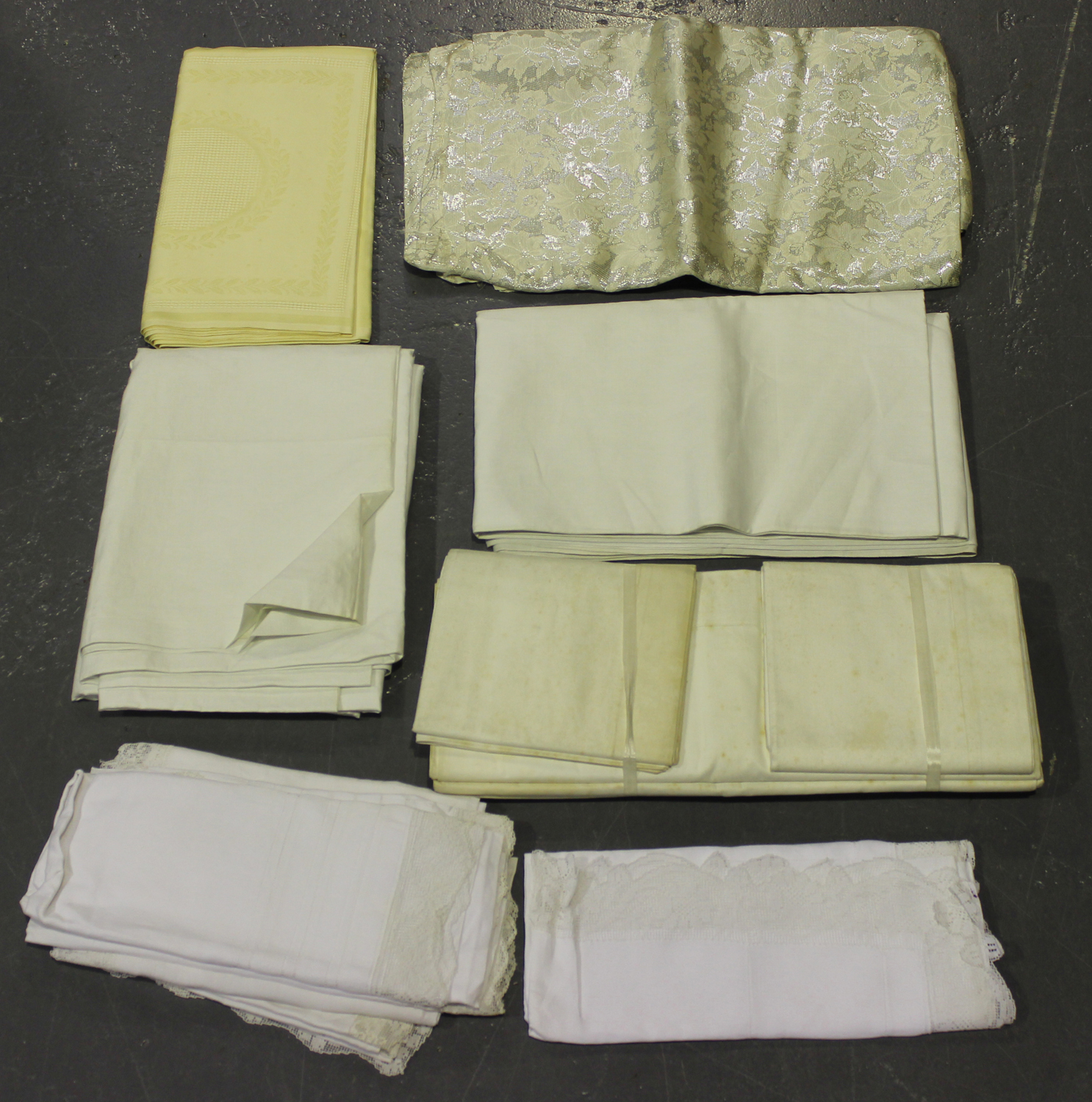 A collection of early/mid-20th century table and bed linen, including embroidered tablecloths, woven - Image 2 of 2
