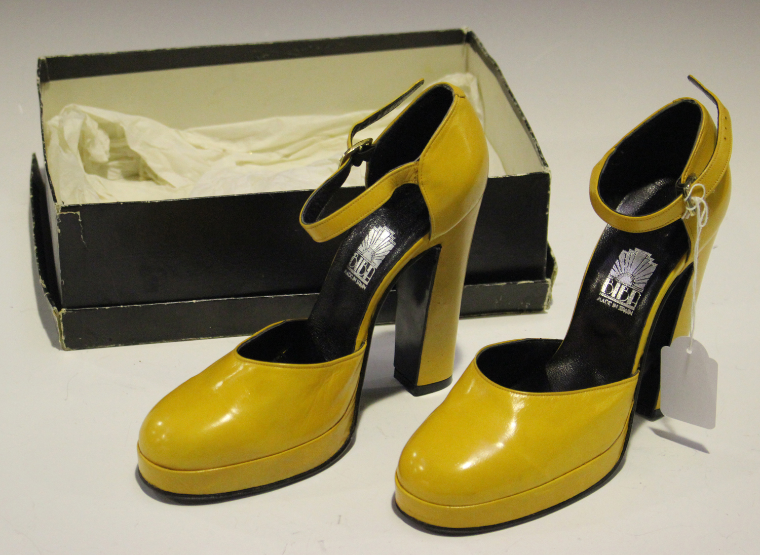 A pair of mid-20th century yellow leather high-heeled lady's shoes by Biba, size 5½, boxed.Buyer’s