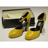 A pair of mid-20th century yellow leather high-heeled lady's shoes by Biba, size 5½, boxed.Buyer’s