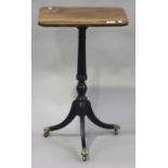 A Regency rosewood rectangular wine table with boxwood stringing, raised on a turned column and