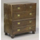 A late 19th/early 20th century mahogany campaign chest of two short and three long drawers with