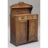 A 19th century Dutch mahogany and oak chiffonier with chequer stringing and gilt metal mounts, the