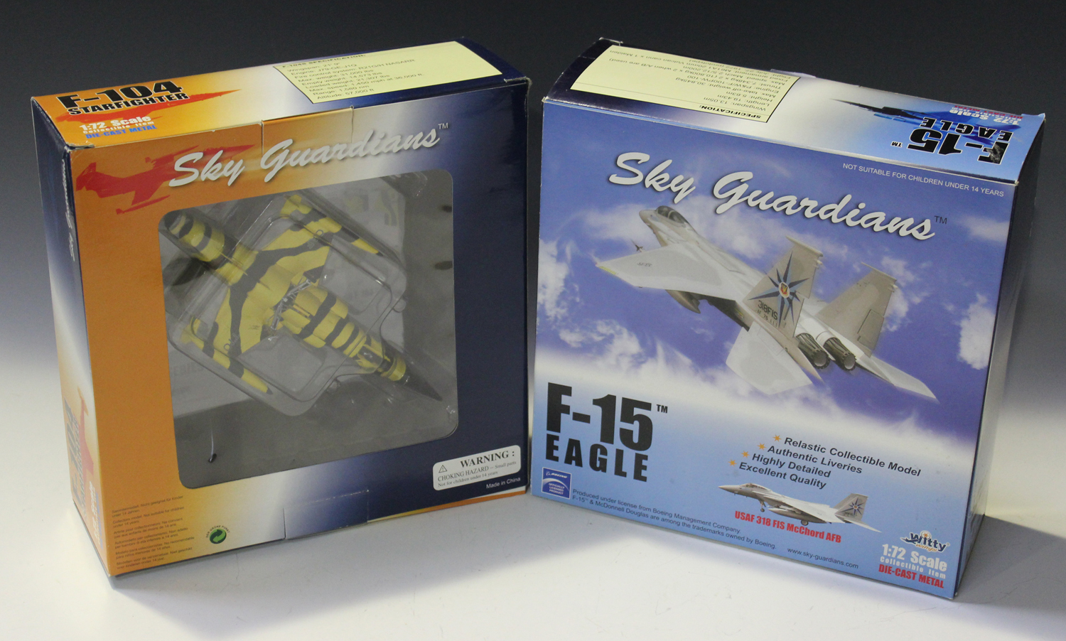 Eight Witty Wings Sky Guardians 1:72 scale model fighter aircraft, comprising four F-104