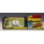 A Corgi Toys No. 431 Volkswagen pick-up, finished in yellow with red canopy, within a blue and