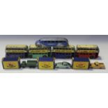 Four Dinky Toys No, 29c double deck buses, two finished in blue and cream, one in green and cream