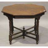 An Edwardian walnut octagonal centre table, on turned supports united by stretchers, height 69cm,