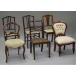 A Victorian walnut dining chair, a pair of Edwardian chairs and three other chairs.Buyer’s Premium