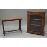 A late Victorian walnut pier cabinet with inlaid decoration, fitted with a glazed door, on block